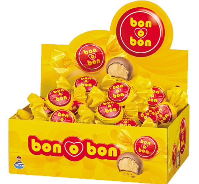 Front of zip tote bag with white canvas, black canvas straps and handle, and black zipper pulls.